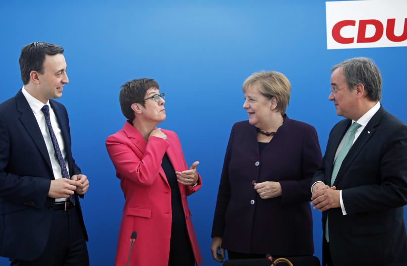 Germany’s CDU Secretary General Paul Ziemiak, Defense Minister and CDU Chairwoman Annegret Kramp-Karrenbauer, Chancellor Angela Merkel and Armin Laschet, federal Prime Minister of North Rhine-Westphalia, attend a CDU board meeting in Berlin last year (photo credit: REUTERS)