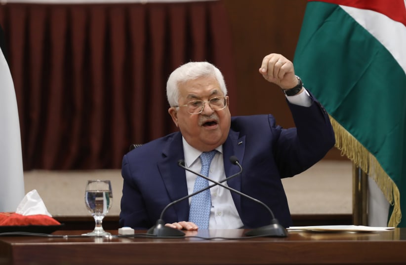 Palestinian President Mahmoud Abbas speaks during a leadership meeting in Ramallah, in the West Bank May 19, 2020 (photo credit: ALAA BADARNEH/POOL VIA REUTERS)