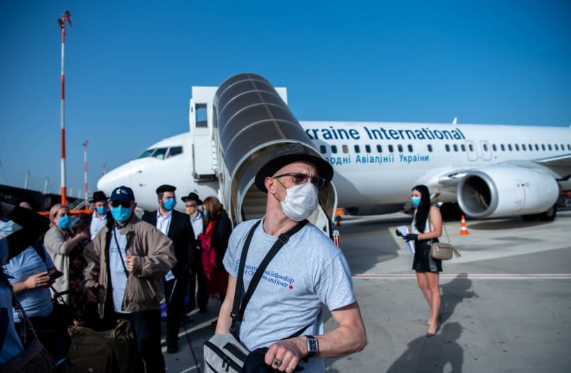 Jews making aliyah from Ukraine arrive on  International Fellowship of Christians and Jews sponsored flight (photo credit: ARIK SHRAGA)