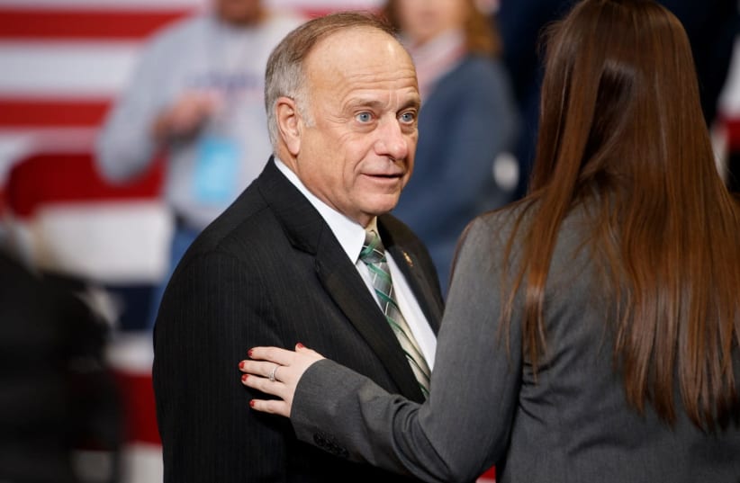 Rep. Steve King of Iowa speaks to an audience member ahead of a campaign rally at Drake University in Des Moines, Jan. 30, 2020. (photo credit: TOM BRENNER/GETTY IMAGES)
