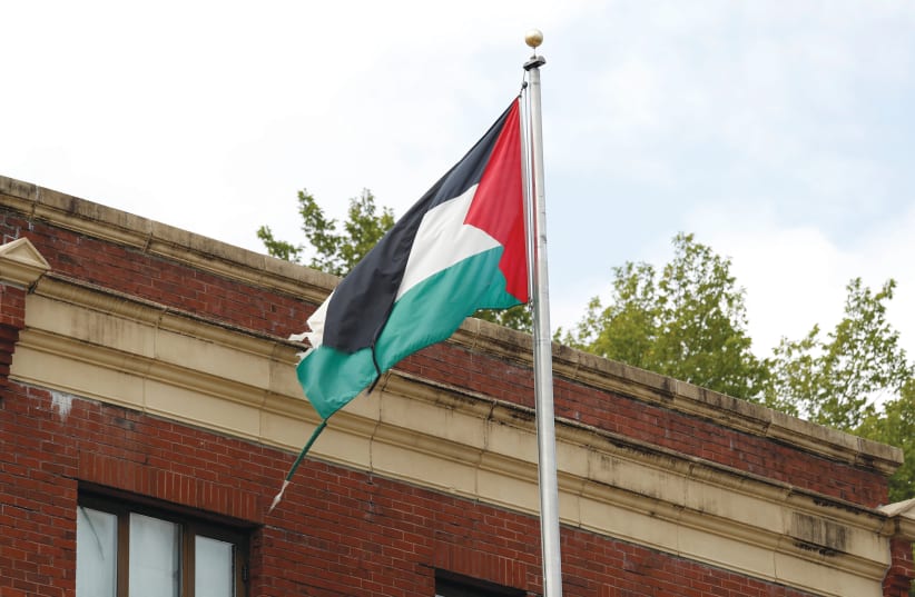 THE PALESTINIAN flag flies at a Palestinian Authority diplomatic post. (photo credit: REUTERS)