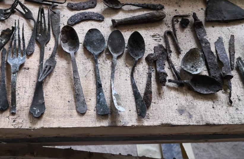 Items concealed by prisoners found in Block 17 of the former Auschwitz main camp, April 21, 2020 (photo credit: NATIONAL FUND/KACZMARCZYK/MARSZAŁEK)