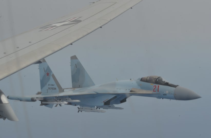 Two Russian Su-35 aircraft unsafely intercept a P-8A Poseidon patrol aircraft assigned to U.S. 6th Fleet over the Mediterranean Sea May 26, 2020 (photo credit: US 6TH FLEET)