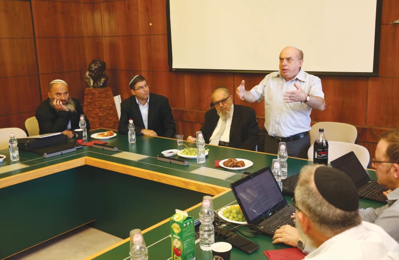FORMER JEWISH Agency chairmain Natan Sharansky speaks at an ITIM Annual Conversion Conference with Rabbi Nahum Rabinovitch (to his right) and Farber (to his far right). (photo credit: ITIM)