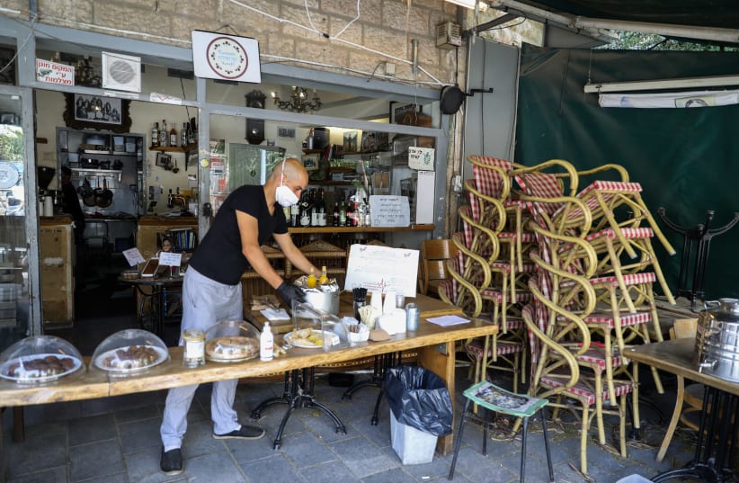 PURCHASING MEALS through the Headstart campaign is one of the ways customers can support Rehavia eateries Bab El Yemen and Carousela café  (photo credit: MARC ISRAEL SELLEM/THE JERUSALEM POST)