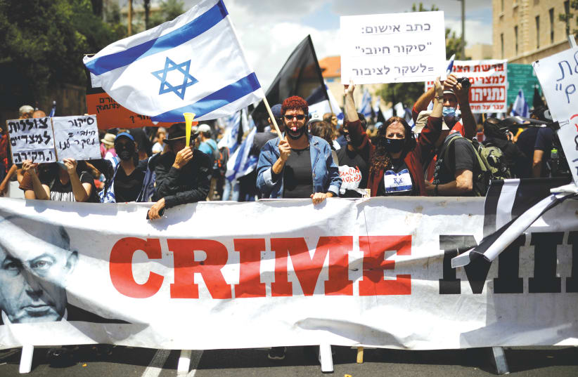 A PROTEST against Prime Minister Benjamin Netanyahu in Jerusalem.  (photo credit: REUTERS)