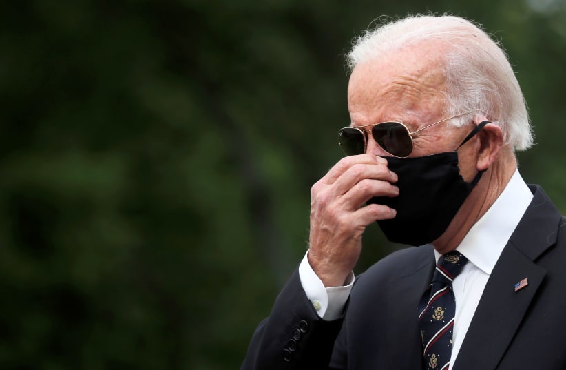 Democratic US presidential candidate and former vice president Joe Biden is seen at War Memorial Plaza during Memorial Day, amid the outbreak of the coronavirus disease (COVID-19), in New Castle, Delaware, US May 25, 2020. (photo credit: CARLOS BARRIA / REUTERS)