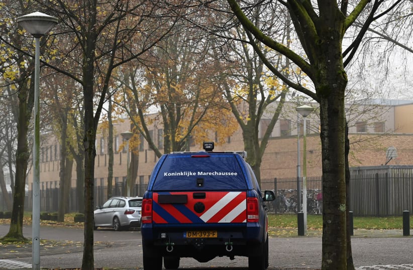 A car belonging to the Dutch security forces guarding the Maimonides and Rosj Pina Jewish schools in Amsterdam, Nov. 25, 2019 (photo credit: CNAAN LIPHSHIZ/JTA)