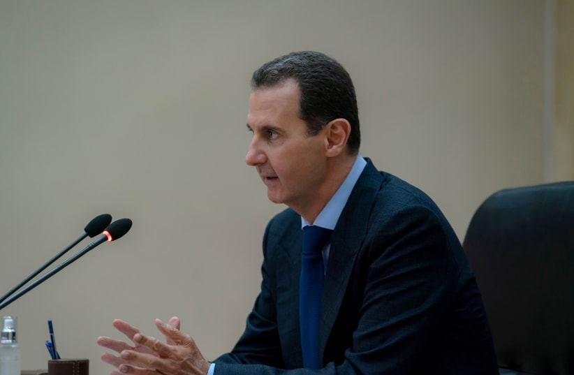 Syrian President Bashar al-Assad addresses the government committee that oversees measures to curb the spread of the coronavirus disease (COVID-19), in Damascus, Syria in this handout released by SANA on May 4, 2020 (photo credit: SANA/HANDOUT VIA REUTERS)