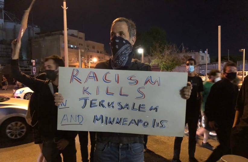 Protesters in Tel Aviv protesting police racism  (photo credit: ANNA AHRONHEIM)