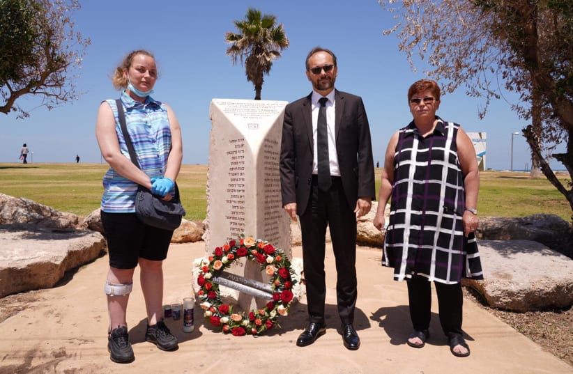 EU AMBASSADOR to israel Emanuel Joffre is seen at the memorial for the victims of the 2001 Dolphinarium massacre alongside survivor Alona Shaportov (L) and her mother Irena. (photo credit: RONI KAUFMAN)