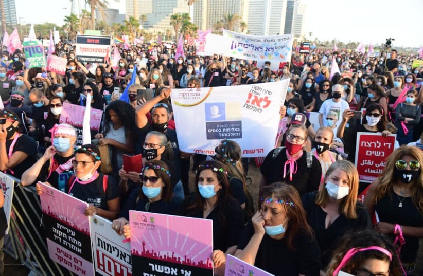 Protesters gather in Tel Aviv to protest the rising domestic violence during the coronavirus pandemic. (photo credit: AVSHALOM SASSONI/MAARIV)