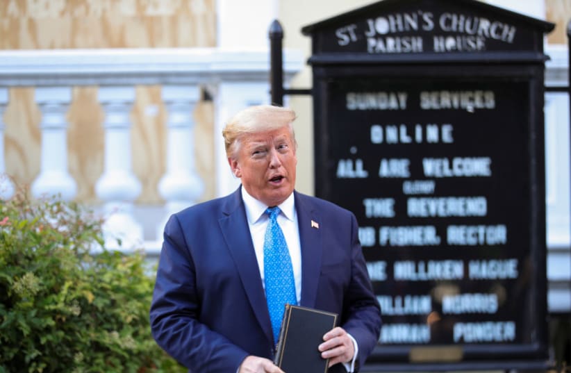 US President Trump holds photo opportunity in front of St John's Church in Washington (photo credit: REUTERS/TOM BRENNER)