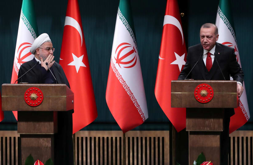 Turkish President Tayyip Erdogan and his Iranian counterpart Hassan Rouhani (photo credit: REUTERS/UMIT BEKTAS)