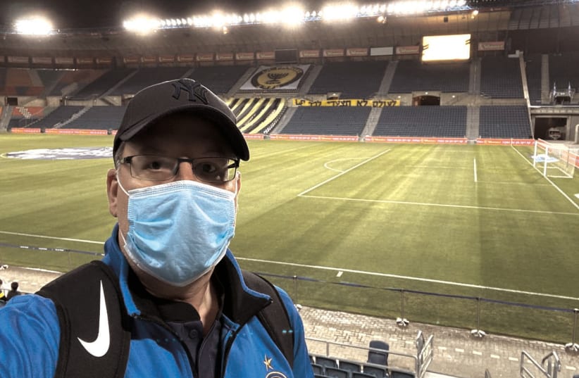THE AUTHOR takes a selfie at an empty Teddy Stadium on Saturday in the first game since the Israeli soccer league returned from a long hiatus (photo credit: JOSHUA HALICKMAN/COURTESY)