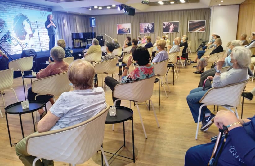 MOSHE BEKER performs for residents at the Meditteranean Towers in Savyon. (photo credit: Courtesy)