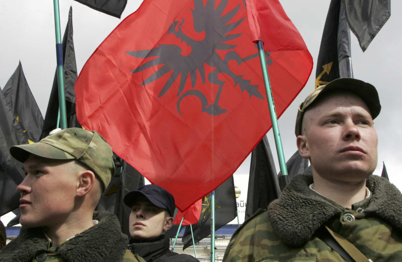 Soldiers guard a rally called the "Imperialist March" organized by the supporters of the Eurasian Youth Union Movement, a right-wing imperialist group who want to a return of the Russian empire in central Moscow April 8, 2007. (photo credit: REUTERS/THOMAS PETER)