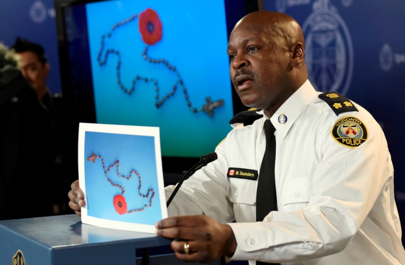 Deputy Chief Police Mark Saunders speaks at a news conference in Toronto, Ontario, February 24, 2015. (photo credit: REUTERS)