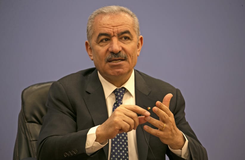 Palestinian Prime Minister Mohammad Shtayyeh addresses journalists during a meeting with members of the Foreign Press Association in Ramallah in the West Bank June 9, 2020 (photo credit: ABBAS MOMANI/POOL VIA REUTERS)