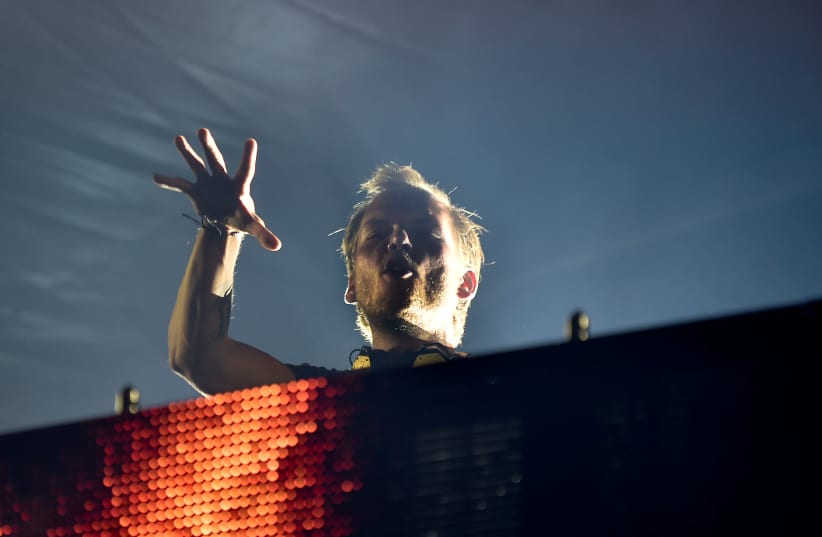 Swedish musician, DJ, remixer and record producer Avicii (Tim Bergling) performs at Pildammsparken in Malmo, Sweden August 5, 2016. (photo credit: BJORN LINDGREN/TT NEWS AGENCY/VIA REUTERS)