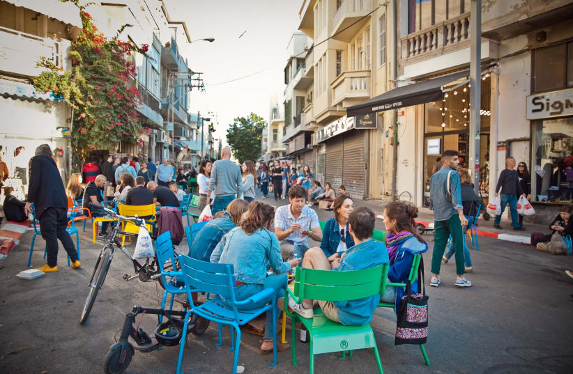 CREATING PEDESTRIAN streets in the city is part of an overall policy that places pedestrians, their vehicles and public transportation at the center. (photo credit: TEL AVIV-JAFFA MUNICIPALITY)