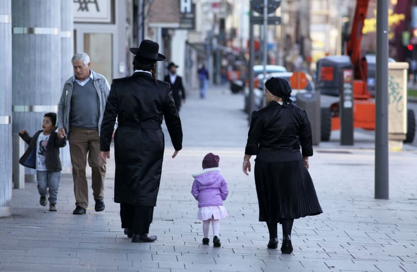 Orthodox Jews in Antwerp, Belgium, in 2012 (photo credit: ALEXANDER STEIN/ULLSTEIN BILD VIA GETTY IMAGES)