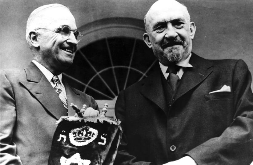ISRAEL’S FIRST president Chaim Weizmann presents US president Harry Truman with a Torah in 1948.  (photo credit: COURTESY HARRY S. TRUMAN LIBRARY & MUSEUM)