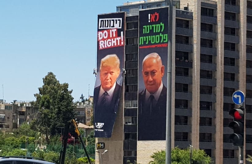 Signs abour annexation with pictures of US President Donald Trump and Prime Minister Benjamin Netanyahu are displayed in Israel (photo credit: COURTESY YESHA COUNCIL)