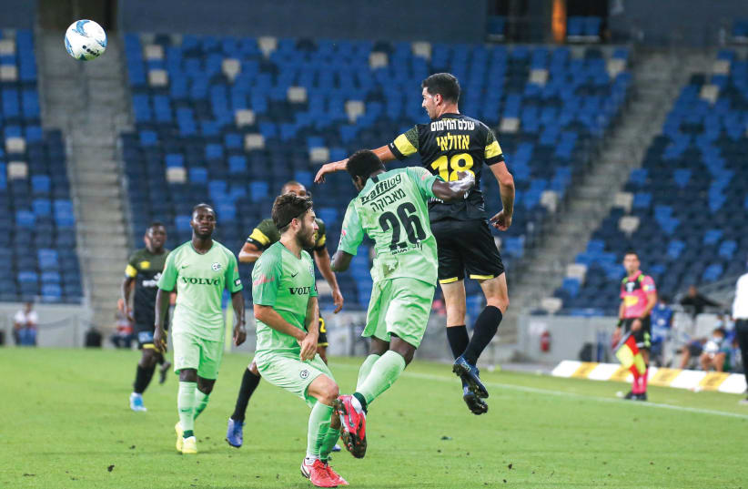 SHLOMI AZULAY (right) and Beitar Jerusalem have had problems finding the back of the net recently, with the club from the capital playing to yet another 0-0 draw over the weekend, this time at Maccabi Haifa, in Premier League Championship Playoff action.  (photo credit: MAOR ELKASLASI)