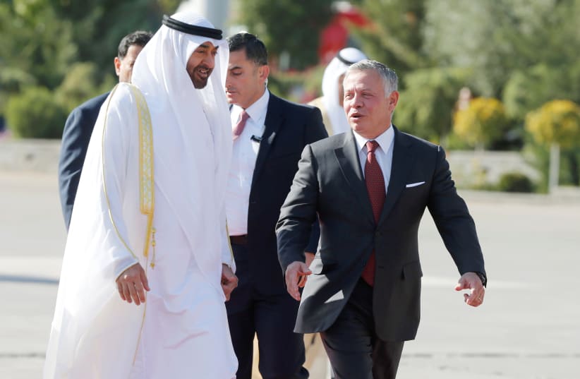 Abu Dhabi's Crown Prince Sheikh Mohammed bin Zayed al-Nahyan meets with Jordan's King Abdullah at Amman military airport, Jordan, November 20, 2018 (photo credit: REUTERS/MUHAMMAD HAMED)