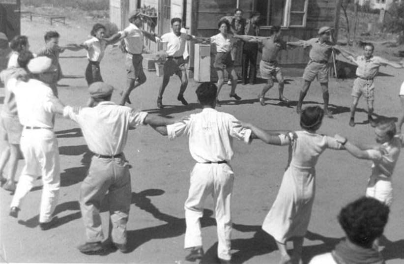 Young Israelis dance in one of the first Jewish settlements between 1934 and 1937 (photo credit: PIKI WIKI)