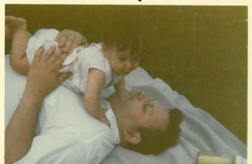 BEST OF friends: The writer, aged seven months, with her dad. (photo credit: Courtesy)