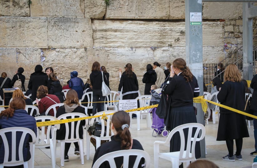 SOCIALLY DISTANT prayer at the Western Wall on March 15. (photo credit: YAEL ZAMIR/FLASH90)