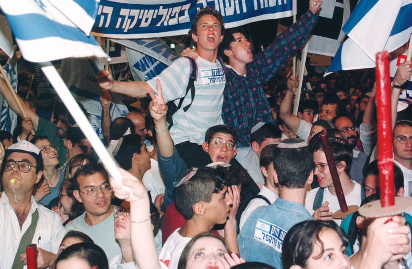 ISRAELIS PROTEST the Oslo II peace accords. (photo credit: REUTERS)
