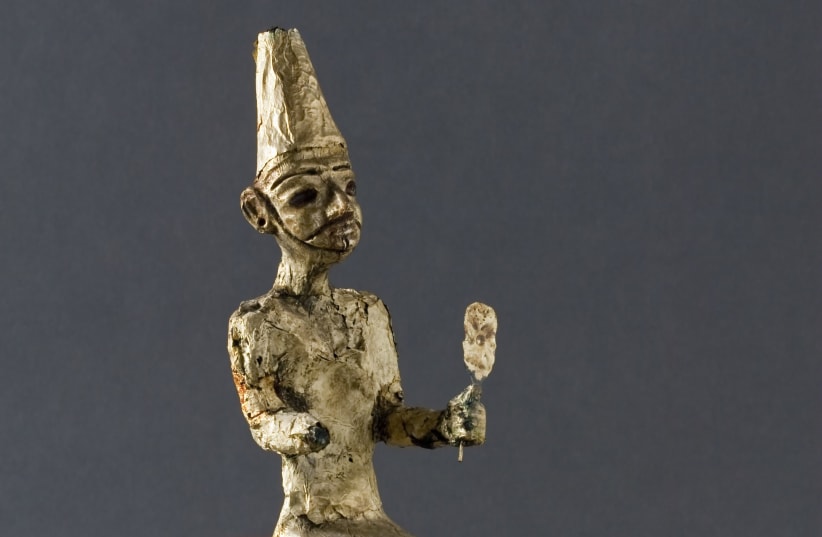 Canaanite figurine of a seated god from Late Bronze Age Megiddo  (photo credit: COURTESY OF THE ORIENTAL INSTITUTE OF THE UNIVERSITY OF CHICAGO)