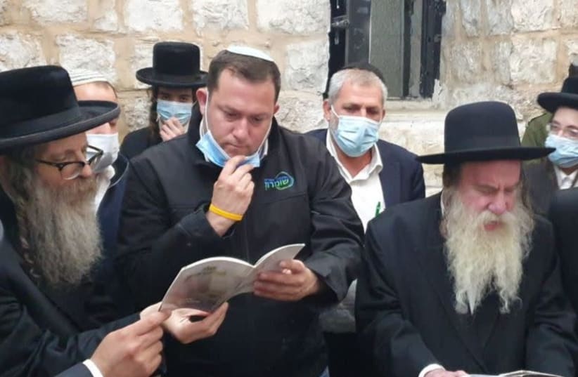 Rabbi Rabbi Gross, Head of the Sumaria Regional Council Yossi Dagan, and Rebbe of the Lulov Hassidic sect at the Tomb of Joseph on Monday, June 22. (photo credit: ROI HADI)
