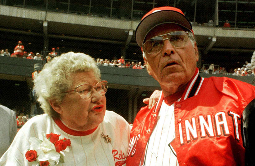 File photo of then Cincinnati Reds' manager Jack McKeon (R) talking with then team owner Marge Schott before their opening day game against the San Francisco Giants, April 5, 1999 at Cinergy Field in Cincinnati, Ohio (photo credit: REUTERS)