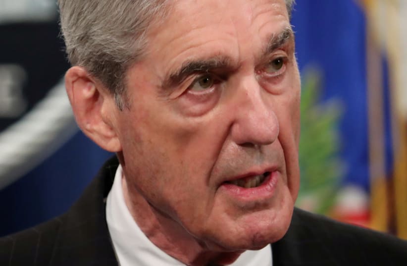 FORMER US special counsel Robert Mueller discusses Russian interference in the 2016 US presidential election. (photo credit: REUTERS/JIM BOURG)