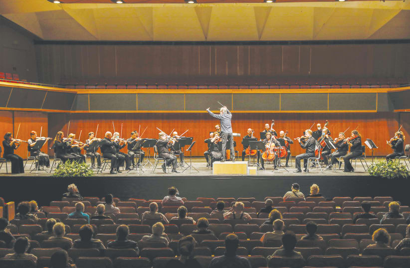 ILAN VOLKOV conducting the concert at Jerusalem’s ICC auditorium. (photo credit: GUY YECHIELI)