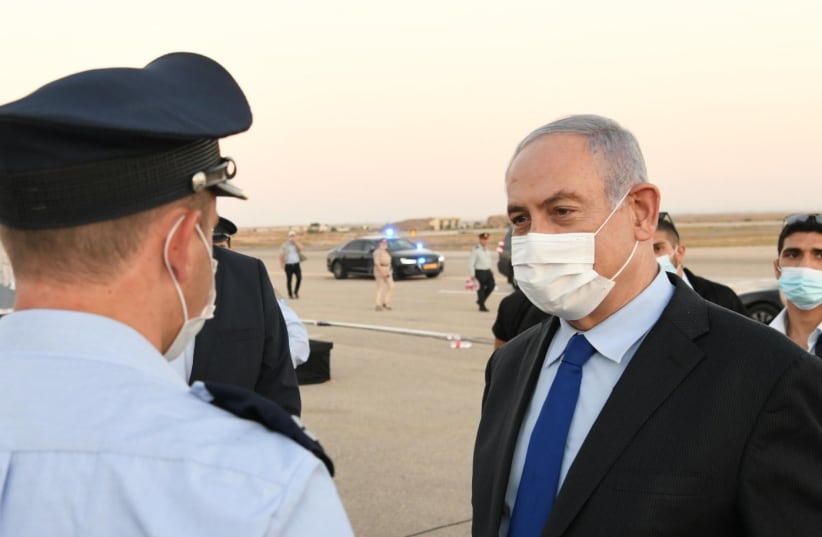 Prime Minister Benjamin Netanyahu at an Israel Air Force pilots’ course graduation ceremony (photo credit: AMOS BEN-GERSHOM/GPO)
