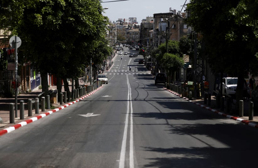A general view shows a street in Bnei Brak as Israel enforces a lockdown, April 3, 2020 (photo credit: AMMAR AWAD/REUTERS)
