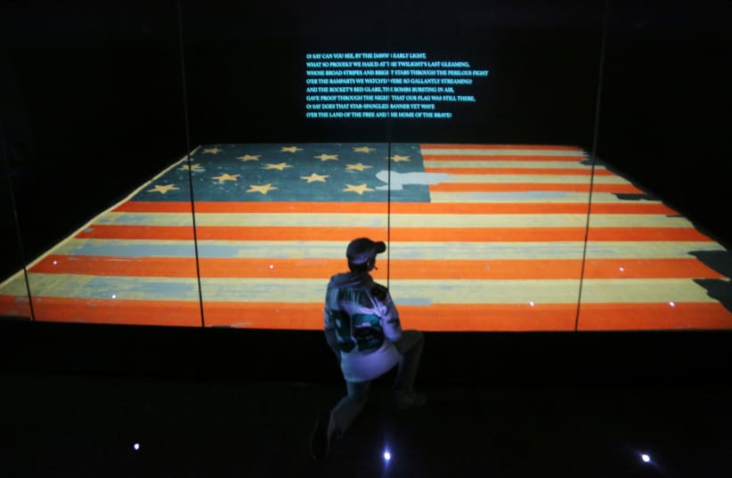 "The Star Spangled Banner," which flew over Fort McHenry in the War of 1812, seen at the Smithsonian Museum of American History in Washington.  (photo credit: REUTERS/CHRIS HELGREN)