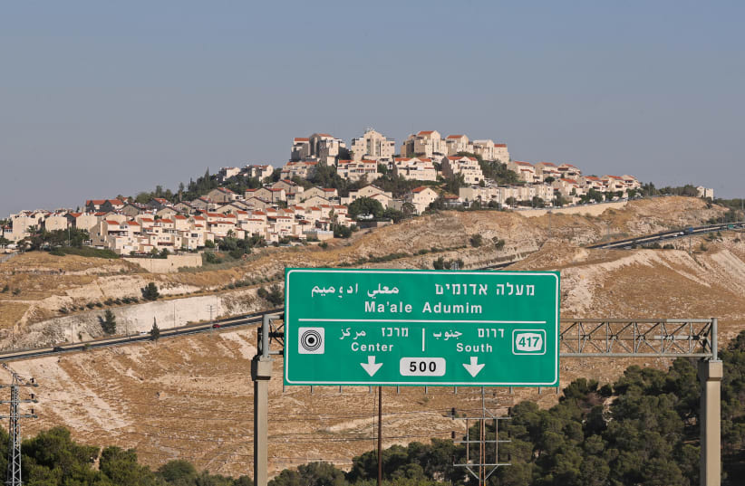 A view shows the West Bank settlement of Ma'aleh Adumim, June 30, 2020. (photo credit: AMMAR AWAD/REUTERS)