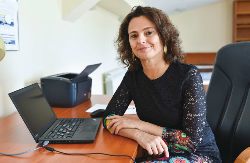 ISRAELI AMBASSADOR TO SERBIA Dr. Alona Fisher-Kamm at her desk in the embassy in Belgrade. (photo credit: ISRAELI EMBASSY IN BELGRADE)
