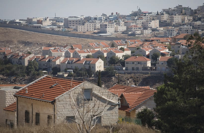 A VIEW of the Pisgat Ze’ev neighborhood, with the security barrier in the background (photo credit: HADAS PARUSH/FLASH90)