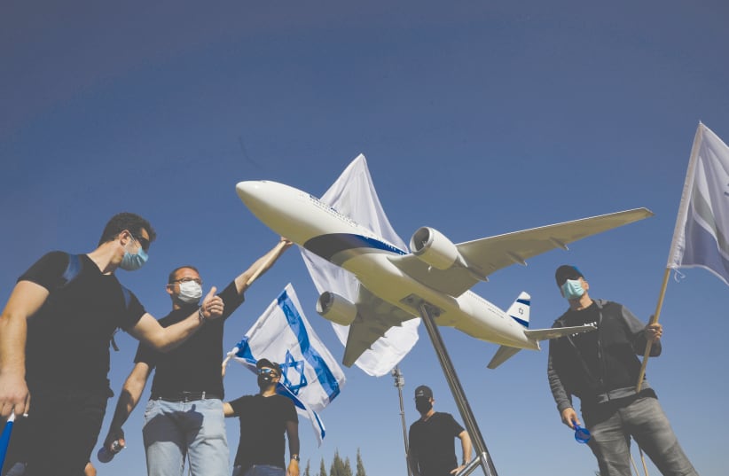 EL AL EMPLOYEES take part in a May protest asking for a recovery plan for the cash-strapped airline, in Jerusalem. (photo credit: RONEN ZVULUN/REUTERS)