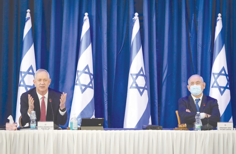 NOT LOOKING so good. Benjamin Netanyahu looks on as Benny Gantz speaks at a recent cabinet meeting. (photo credit: MARC ISRAEL SELLEM/THE JERUSALEM POST)