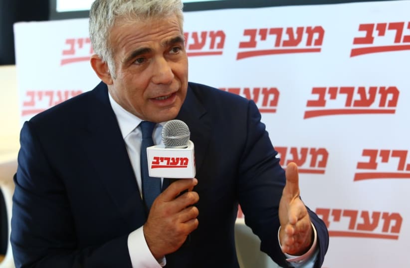 Opposition leader Yair Lapid at the Ma’ariv newspaper’s OECD Conference on Sunday. (photo credit: MAARIV)