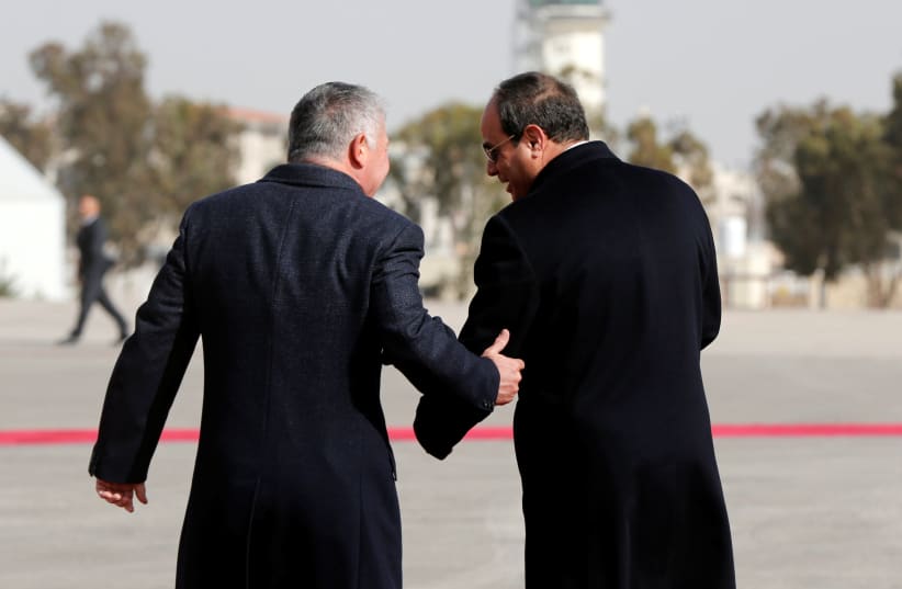 Jordan's King Abdullah welcomes Egyptian President Abdel Fattah al-Sisi at Amman airport (photo credit: MUHAMMAD HAMED/REUTERS)