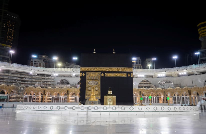 General view of Kaaba at empty Grand Mosque, as a preventive measure against the coronavirus disease (COVID-19), during the holy month of Ramadan, in the holy city of Mecca, Saudi Arabia May 7, 2020 (photo credit: REUTERS)